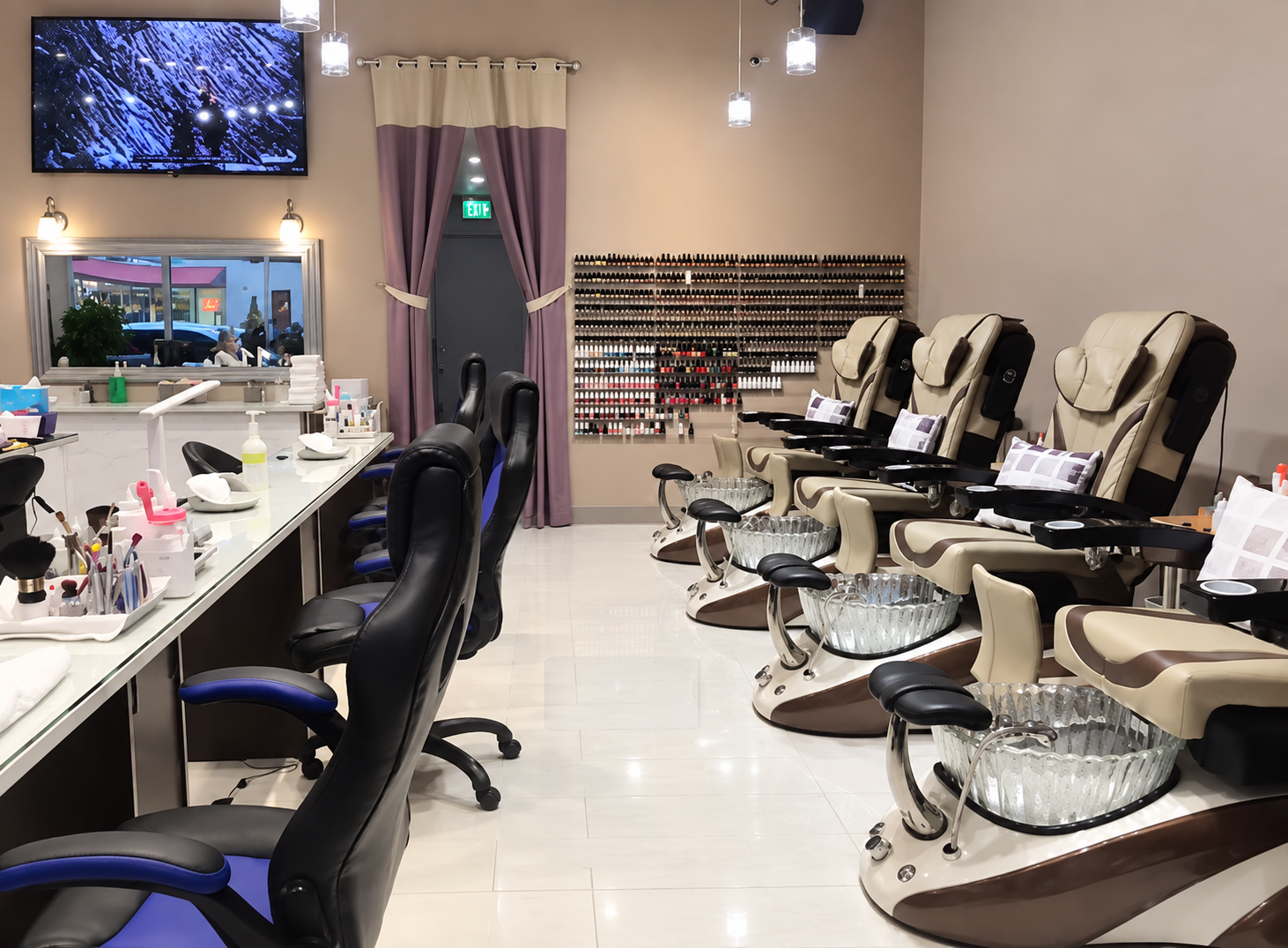 Clean manicure stations and pedicure seating at Morgan